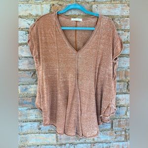 Free people shirt in burnt orange/brown.